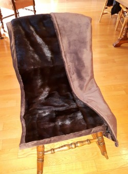 Sleek mink throw with soft chenille backing